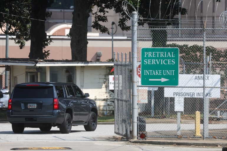 A vehicle enters the Fulton County Jail in Atlanta, Georgia, U.S., August 22, 2023. REUTERS/Dustin Chambers