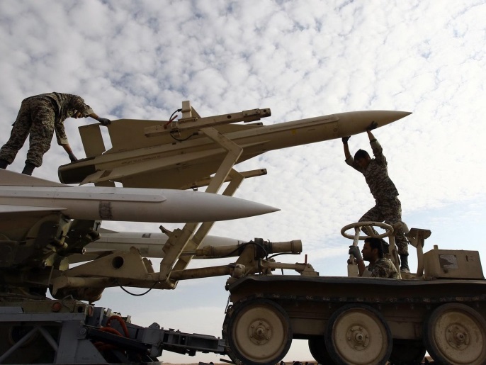 Iranian soldiers prepare to launch a new surface-to-air missile during military exercises in an undisclosed location in eastern Iran, 13 November 2012. Iran on 12 November started renewed war games in its eastern regions, near its western border with Iraq, Iranian state television network IRIB reported. In the seven-day joint manoeuvre by Irans Army and the Revolutionary Guards (IRGC), the radar air defense and missile systems as well as artillery and surveillance syst