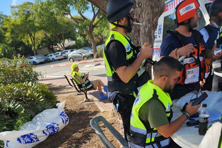 The Zaka volunteer group began collecting bodies in the devastated communities of southern Israel immediately after the Hamas attack, while the IDF sidelined soldiers trained to retrieve remains. An investigation reveals cases of negligence, misinformation and a fundraising campaign that used the dead as props