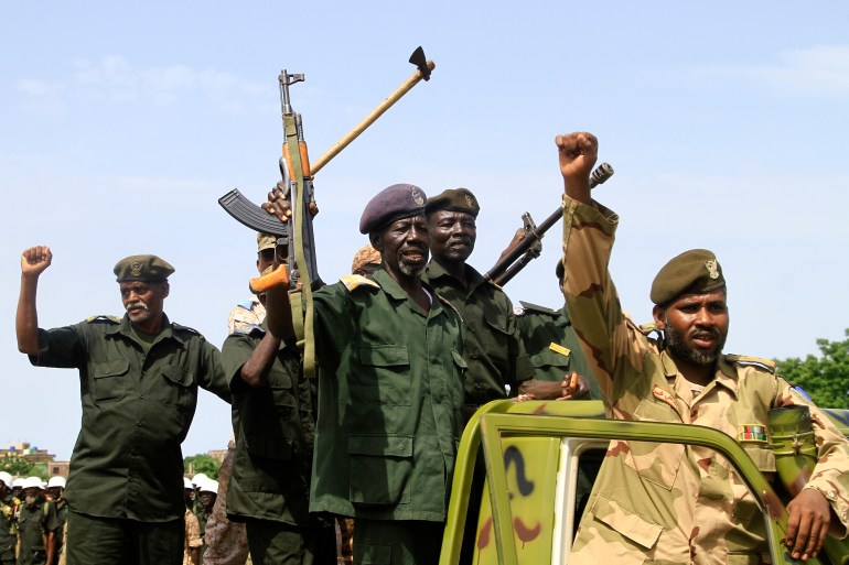 Sudanese armed forces mark Army Day in Sudan's eastern Gadaref State near the border with Ethiopia on August 14, 2023. - Fighting since April 15 between the forces of rival Sudanese generals vying for power has killed at least 3,900 people, according to conservative estimates by the Armed Conflict Location & Event Data Project. (Photo by - / AFP)