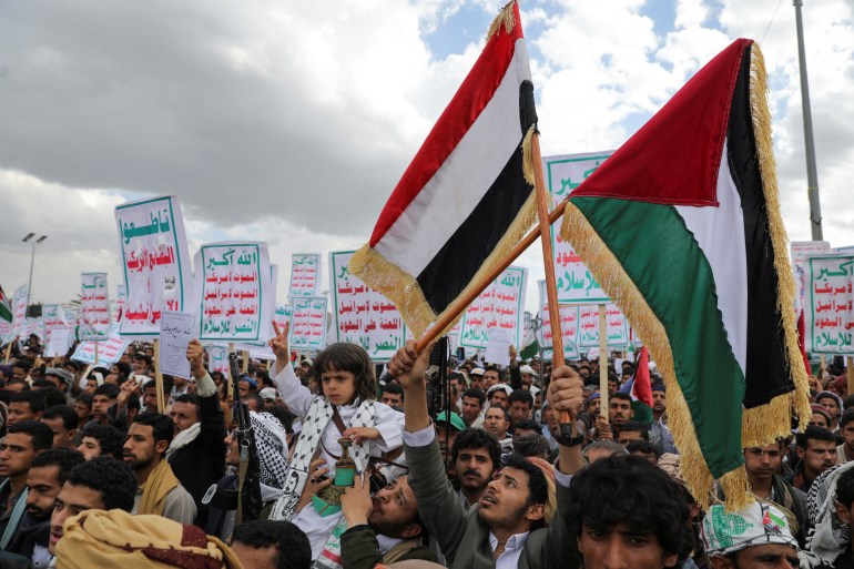 A child flashes the victory sign, at a rally by predominantly Houthi supporters, to show support for Palestinians in the Gaza Strip amid the continued Israeli onslaught, in Sanaa, Yemen February 9, 2024. REUTERS/Khaled Abdullah