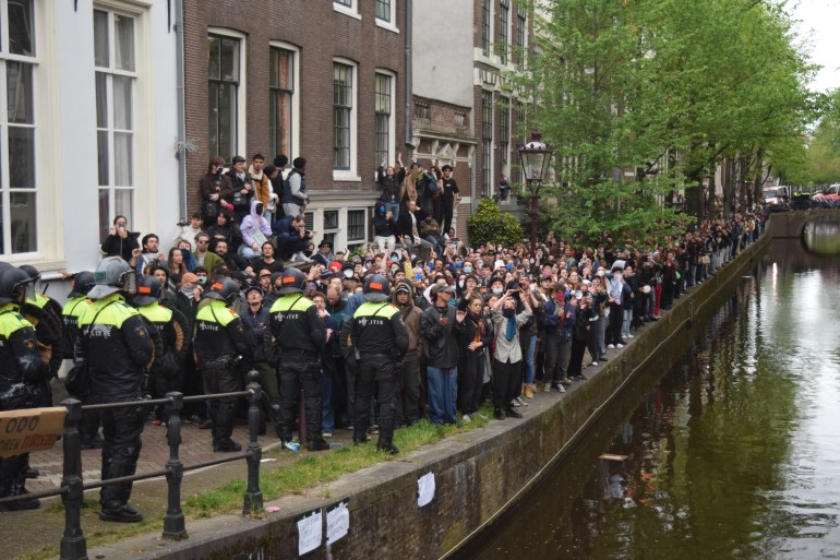 AMSTERDAM, NETHERLANDS - MAY 08: Police forcefully intervene, arrest dozens and assaulting others in Pro-Palestinian protesters at the beginning of the second day as they gathered in University of Amsterdam to stage demonstration to call for their institution to end all ties with Israel and to protest against Israeli attacks over Gaza on May 08, 2024 in Amsterdam, Netherlands. Hundreds of demonstrators gather at the University of Amsterdam's Binnengasthuis grounds and set up barricades in a pro-Palestinian protest. As the second day begins, most roads leading to Rembrandtplein remain closed, with additional street closures. (Photo by Mouneb Taim/Anadolu via Getty Images)