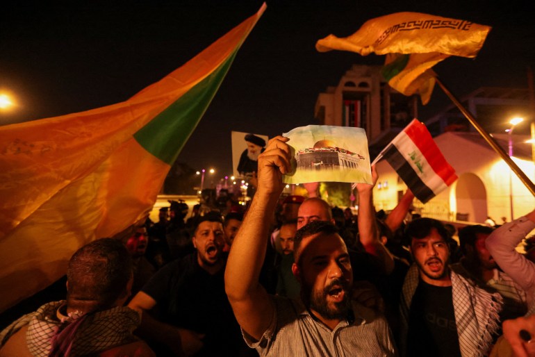 Iraqis take part in a protest after hundreds of Palestinians were killed in a blast at Al-Ahli hospital in Gaza that Israeli and Palestinian officials blamed on each other, in Baghdad, Iraq, October 17, 2023. REUTERS/Ahmed Saad