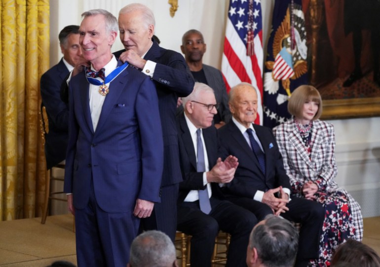 U.S. President Joe Biden presents the Presidential Medal of Freedom to Bill Nye, during a ceremony in the East Room of the White House, in Washington, U.S. January 4, 2025. REUTERS/Ken Cedeno