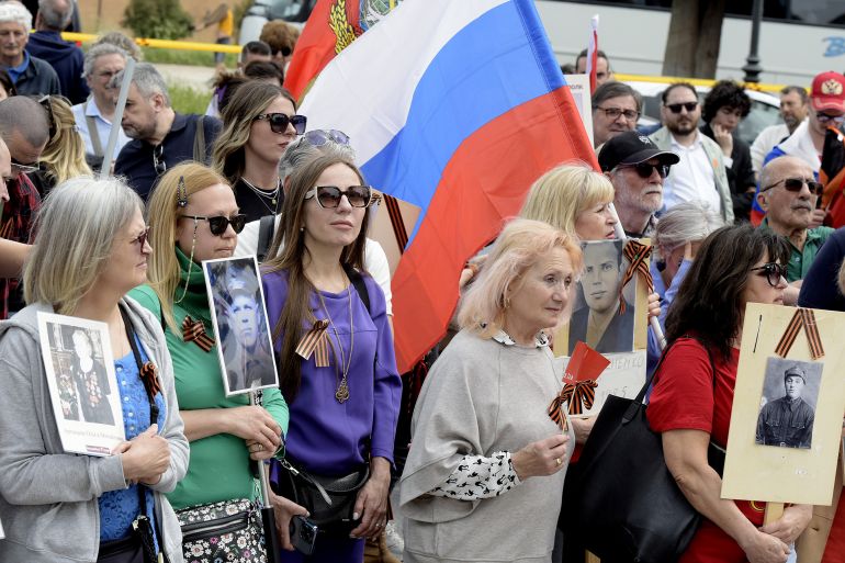 ROME, ITALY - MAY 4: Russian people and sympathizers gather in Piazza Ugo La Malfa to celebrate the Immortal Regiment on the anniversary of the Soviet victory over Nazi Germany with photos of the fighters, Soviet banners and St George's ribbon on May 4, 2025 in Rome, Italy. The event, which started in Russia on the fringes of Victory Day (on May 9), celebrates Russia's defeat of Nazism and aims to "immortalize" the memory of World War II veterans. (Photo by Simona Granati - Corbis/Corbis via Getty Images)