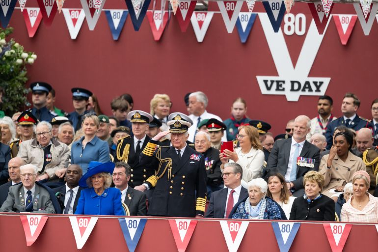 LONDON, ENGLAND - MAY 05: King Charles III and Queen Camilla during the military procession to mark the 80th anniversary of VE Day on May 05, 2025 in London, England. The King and Queen, joined by Members of the Royal Family, will take part in events from May 5th to May 8th to commemorate the 80th anniversary of VE Day, which signalled the end of the Second World War in Europe. (Photo by Samir Hussein/WireImage)