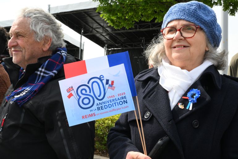 Spectators watch the Commemoration of the 80th anniversary of the end of World War II in Europe, in Reims, north eastern France, where Nazi Germany signed its initial 1945 surrender, on May 7, 2025.